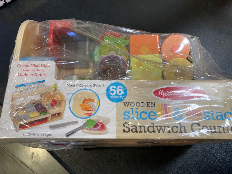 Photo 1 of Melissa & Doug Wooden Slice & Stack Sandwich Counter with Deli Slicer – 56-Piece Pretend Play Food Pieces