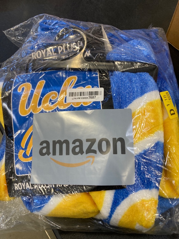 Photo 1 of Northwest NCAA UCLA Bruins Unisex-Adult Raschel Throw Blanket, 50" x 60", Signature