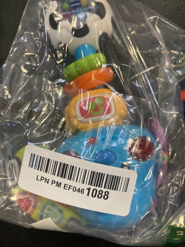Photo 1 of VTech Baby Rattle and Sing Puppy