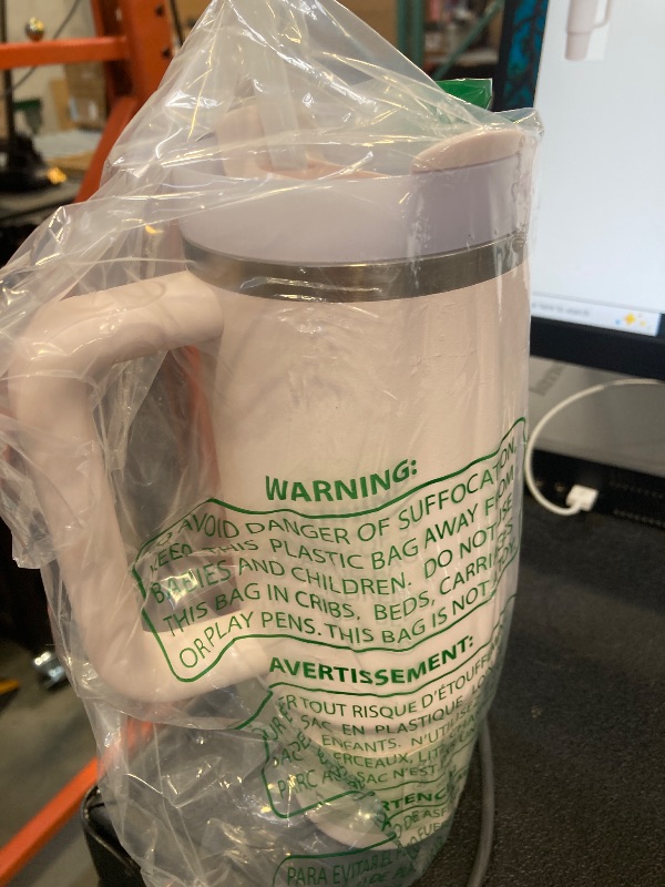 Photo 1 of Stanley Quencher H2.0 Tumbler with Handle and Straw 30 oz | Flowstate 3-Position Lid | Cup Holder Compatible for Travel | Insulated Stainless Steel Cup | BPA-Free | Rose Quartz 2.0