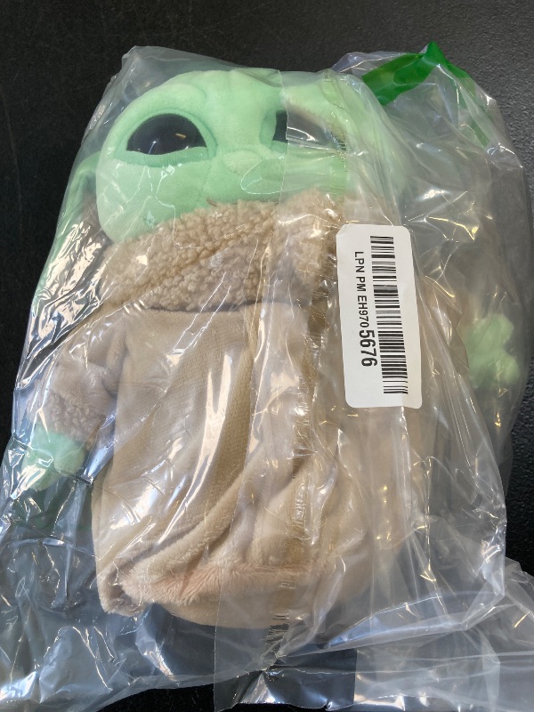 Photo 1 of Mattel Star Wars Plush Figure, 8-inch Grogu Soft Doll, Collectible Toy Inspired by The Fan-Favorite Character from Star Wars The Mandalorian