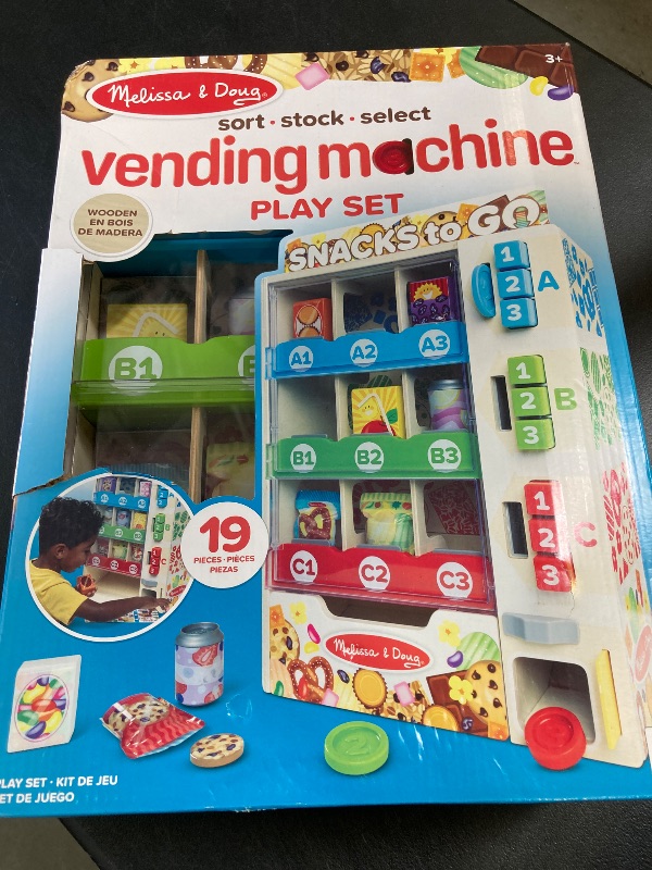 Photo 1 of Melissa & Doug Sort, Stock, Select Wooden Vending Machine Play Set, Wooden Toy Play Food for Boys and for Girls 3+