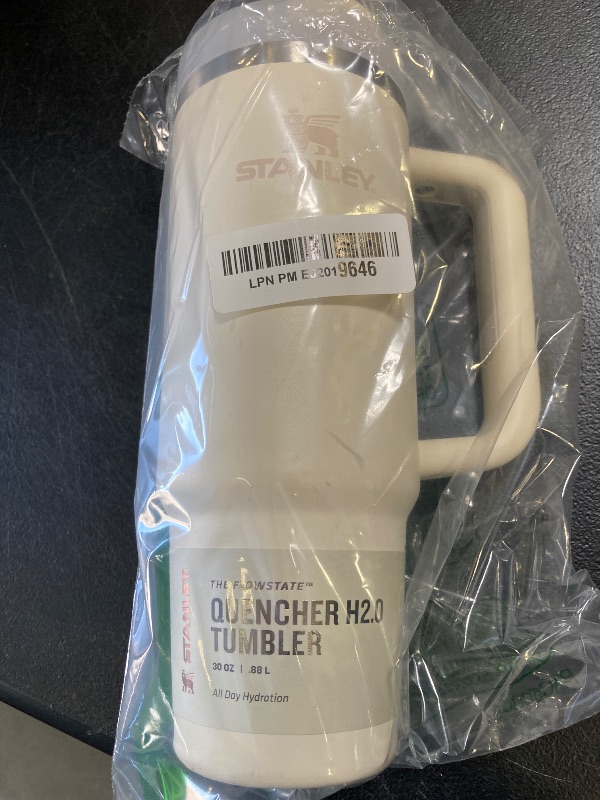Photo 1 of STANLEY Quencher H2.0 Tumbler with Handle and Straw 30 oz | Flowstate 3-Position Lid | Cup Holder Compatible for Travel | Insulated Stainless Steel Cup | BPA-Free | Cream 2.0