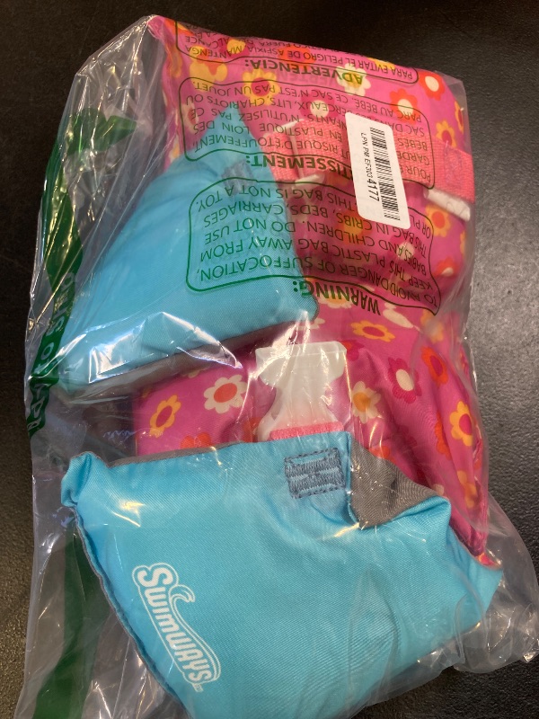 Photo 1 of SwimWays Disney Minnie Swim Trainer, US Coast Guard Approved Life Vest Kids Swim Vest, Arm Floaties & Life Jackets for Kids 33-55 lbs, Minnie