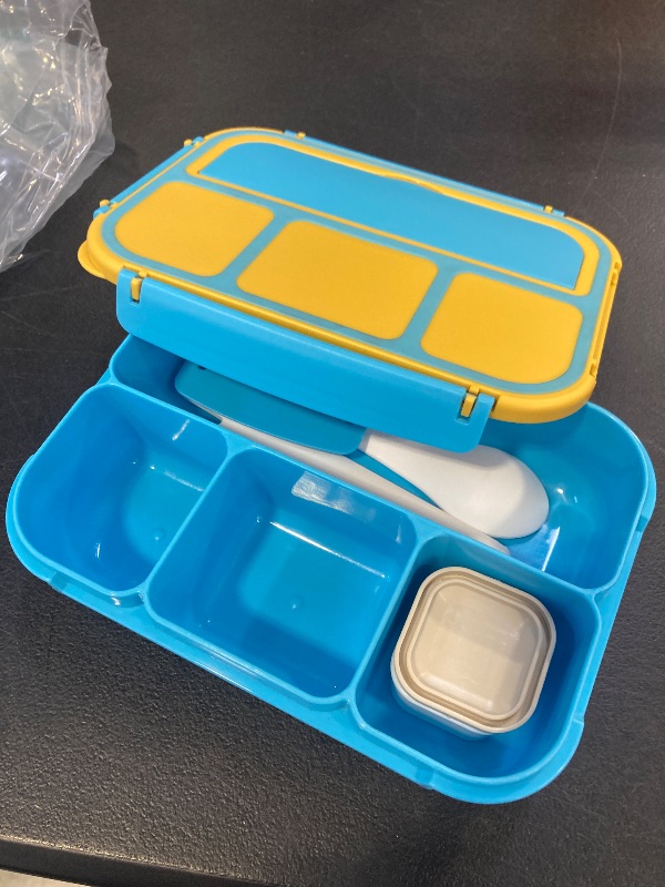 Photo 1 of  Bento Lunch Boxes with 4 Compartments, Sauce Container, Utensils, Food Picks and Muffin Cups for School or Adults, Blue