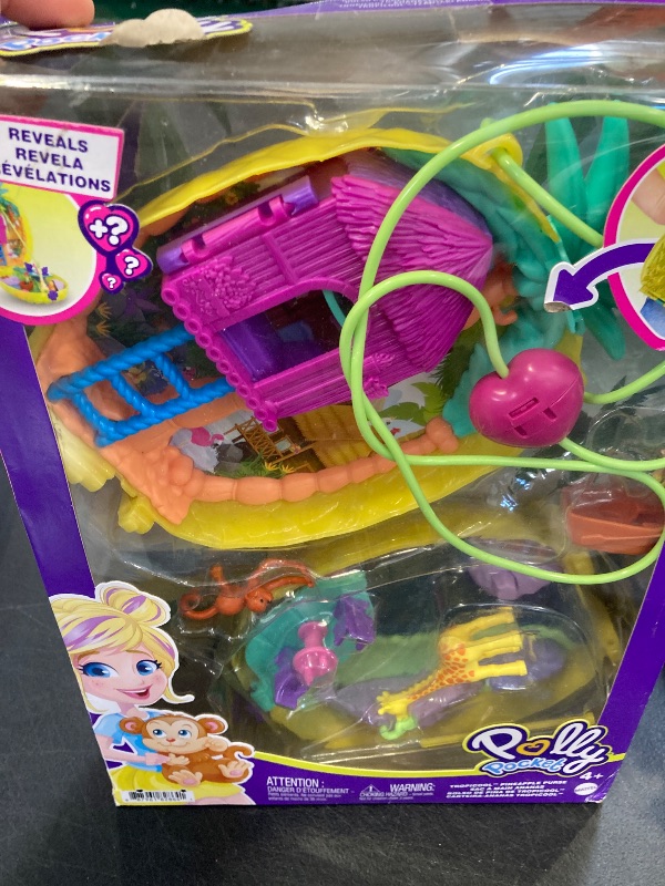 Photo 1 of Polly Pocket Dolls & Accessories, 2-in-1 Travel Toy, Pineapple Purse Playset with Micro Polly & Lila Dolls