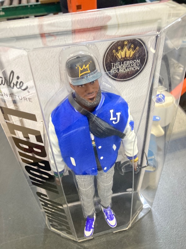 Photo 1 of Barbie Signature Lebron James Kenbassadors Doll Collectible with Varsity Bomber Jacket Outfit & Accessories Including Headphones, Sunglasses, & More