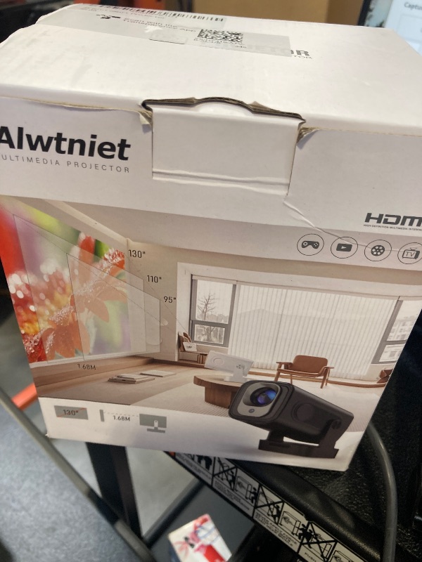 Photo 1 of ?Auto Focus &1080P?Alwtniet Mini Portable Projector, 4k Support Smart Proyector with Wifi and Bluetooth For Outdoor, 5W Speaker, Built in Apps,Home Theater, Bluetooth Movie Projector (Black)