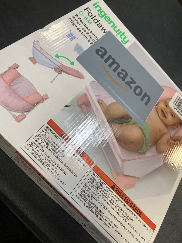 Photo 1 of Ingenuity Foldaway 2-Position Bather, 2-Position Adjustable Support Baby Bath seat for Sink or Bathtub, Ages 0-6 Months, up to 20 pounds, Pink