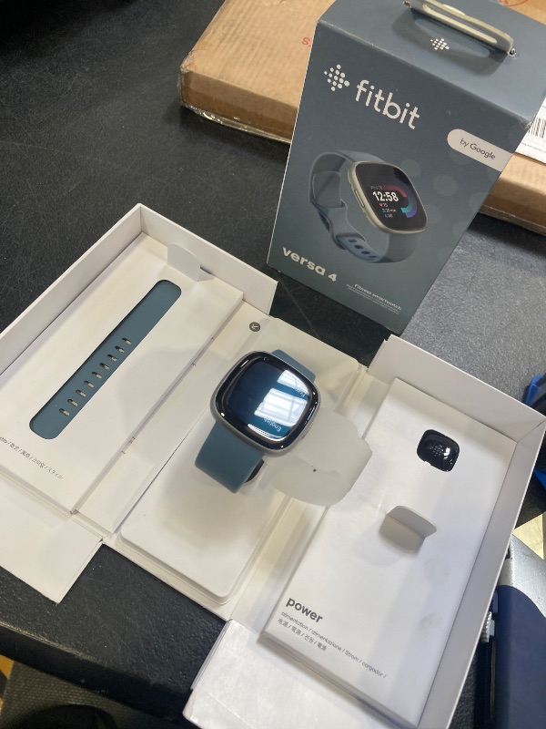Photo 1 of Fitbit Versa 4 Fitness Smartwatch with Daily Readiness, GPS, 24/7 Heart Rate, 40+ Exercise Modes, Sleep Tracking and more, Waterfall Blue/Platinum, One Size (S & L Bands Included)