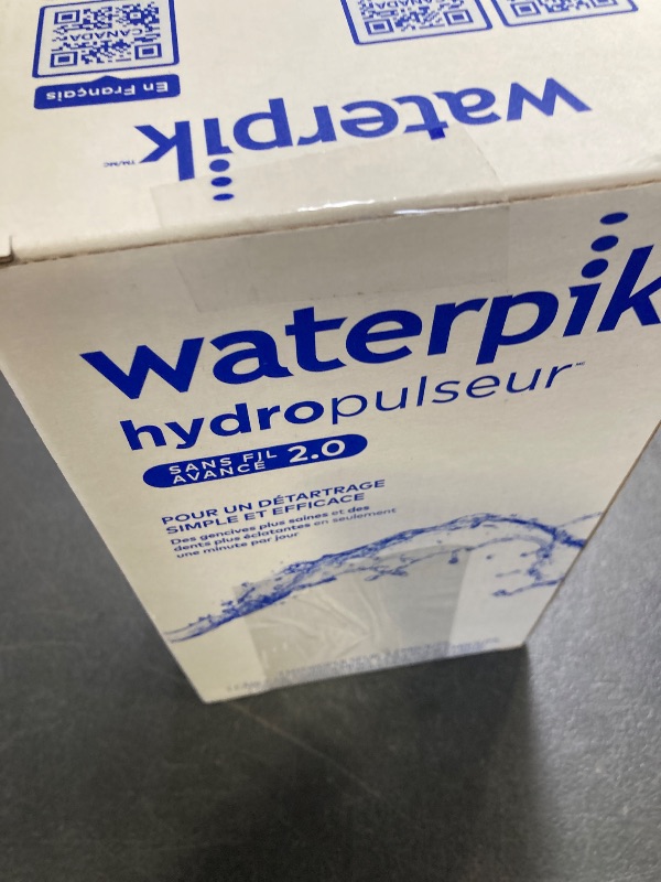 Photo 1 of Waterpik Cordless Advanced 2.0 Water Flosser For Teeth, Gums, Braces, Dental Care With Travel Bag and 4 Tips, ADA Accepted, Rechargeable, Portable, and Waterproof, Blue WP-583, Packaging May Vary