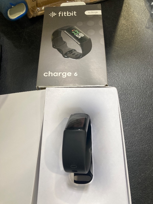 Photo 1 of Fitbit Charge 6 Fitness Tracker with Google apps, Heart Rate on Exercise Equipment, 6-Months Premium Membership Included, GPS, Health Tools and More, Obsidian/Black, One Size (S & L Bands Included)