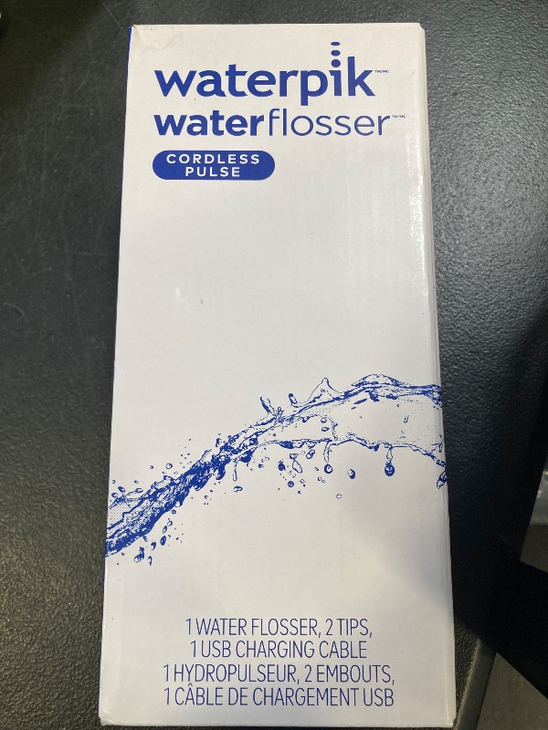 Photo 1 of Waterpik Cordless Pulse Rechargeable Portable Water Flosser for Teeth, Gums, Braces Care and Travel with 2 Flossing Tips, Waterproof, ADA Accepted, WF-20 White, Packaging May Vary