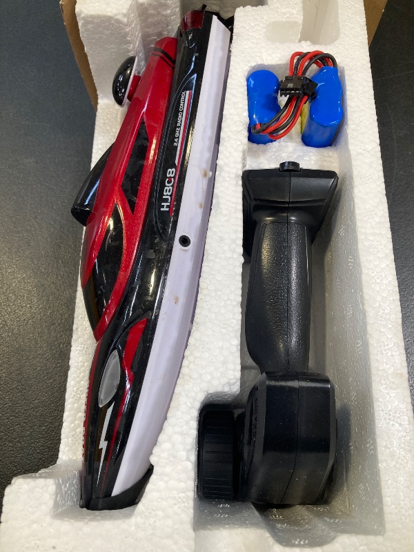 Photo 1 of XDJXWJN RC Boat High Speed Remote Control Boat for Kids and Adults, 2.4GHz Outdoor Water Toy 23 + MPH Race Boat for Pool Lake & Great River