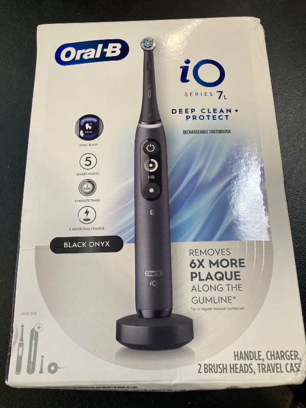 Photo 1 of Oral-B iO Deep Clean + Protect Rechargeable Electric Toothbrush, Black with a iO Series 7 Toothbrush, 2 Replacement Brush Heads, and a Charging Travel Case