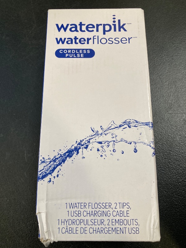 Photo 1 of Waterpik Cordless Pulse Rechargeable Portable Water Flosser for Teeth, Gums, Braces Care and Travel with 2 Flossing Tips, Waterproof, ADA Accepted, WF-20 White, Packaging May Vary