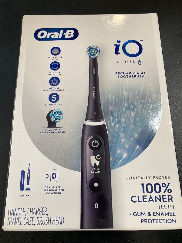 Photo 1 of Oral-B iO Series 6 Rechargeable Electric Toothbrush with Visible Pressure Sensor to Protect Gums, 2 Minute Timer, 5 Cleaning Settings, 1 Replacement Toothbrush Head, and Travel Case, Black
