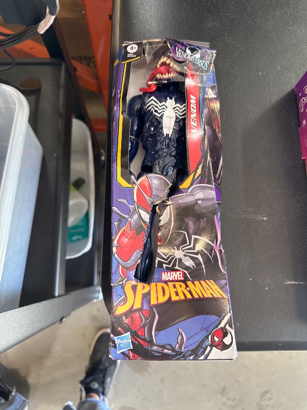 Photo 1 of Spider-Man Marvel VenomVersus Titan Hero Series Venom Action Figure, 12-Inch Super Hero Figures & Toys for Kids Ages 4+