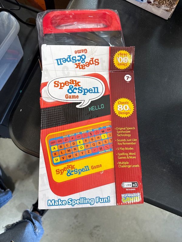 Photo 1 of Playmonster Speak & Spell Electronic Game - Educational Learning Toy, Spelling Games, 80s Retro Handheld Arcade, Autism Toys, Activity for Boys, Girls, Toddler, Ages 7+