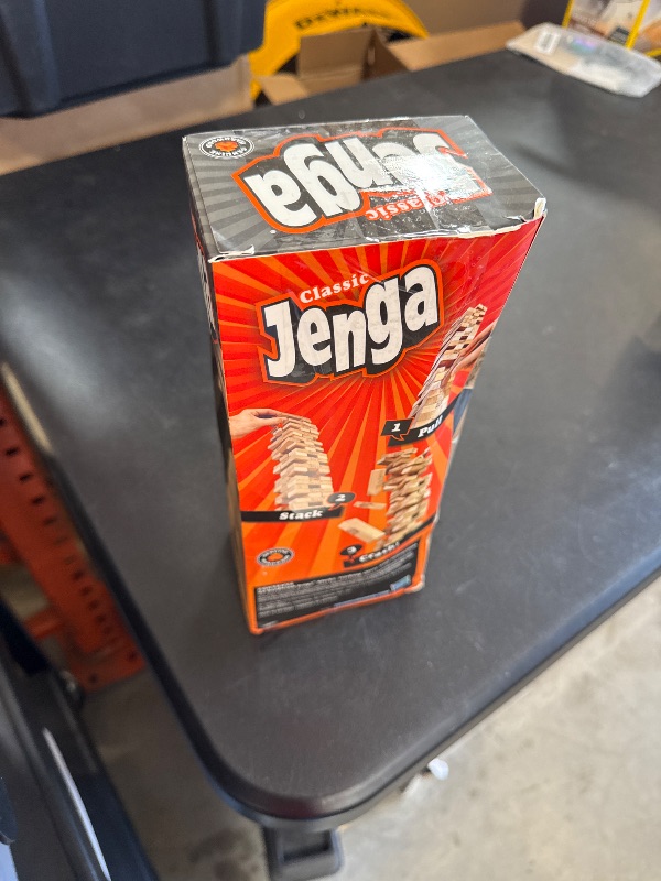 Photo 1 of Jenga Game | The Original Wood Block Game with Genuine Hardwood Blocks | Stacking Tower Game | Ages 6+ | 1 or More Players | Party Games for Kids | Family Games