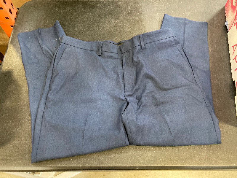 Photo 1 of mens navy blue Kenneth Cole dress pants size 40x30 has tape resin on leg 