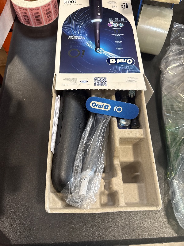 Photo 1 of Oral-B iO Deep Clean + Whiten Rechargeable Electric Toothbrush with Visible Pressure Sensor, 2 Minute Timer, 5 Cleaning Settings, 1 iO5 Limited, 3 Toothbrush Heads, Travel Case & Refill Holder, Black
