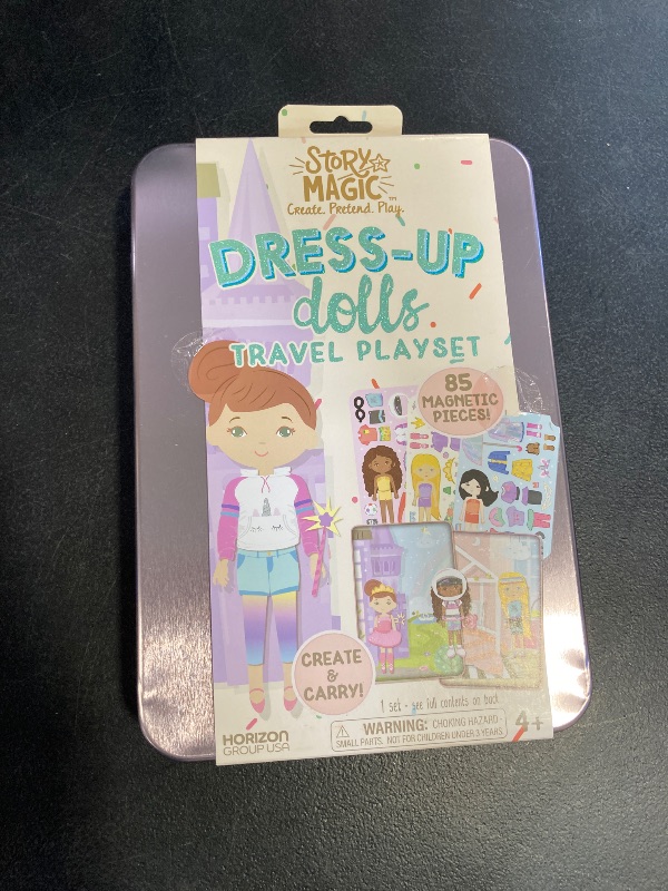 Photo 1 of Story Magic Dress-Up Dolls Playset, Pretend Play Magnetic Case, Magnet Outfit and Accessory Pieces, Great for Travel or Playdates, Magnetic On The Go Activity Set for Ages 4, 5, 6, 7 , Pink