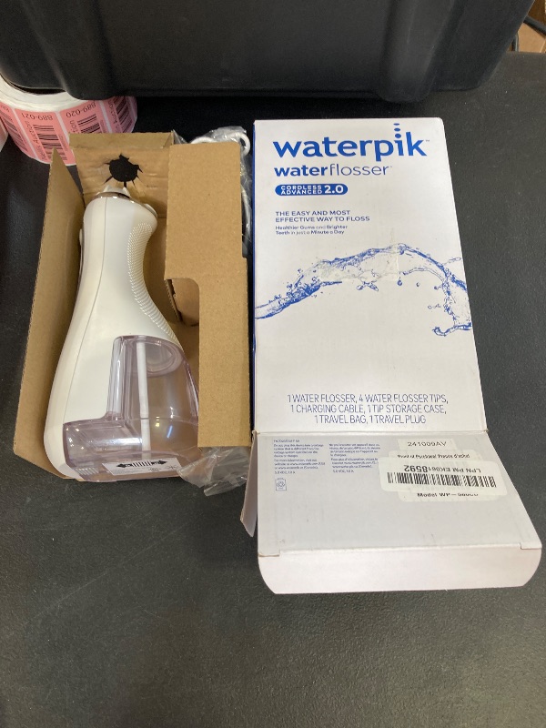 Photo 1 of Waterpik Cordless Advanced 2.0 Water Flosser For Teeth, Gums, Braces, Dental Care With Travel Bag and 4 Tips, ADA Accepted, Rechargeable, Portable, and Waterproof, White WP-580, Packaging May Vary
