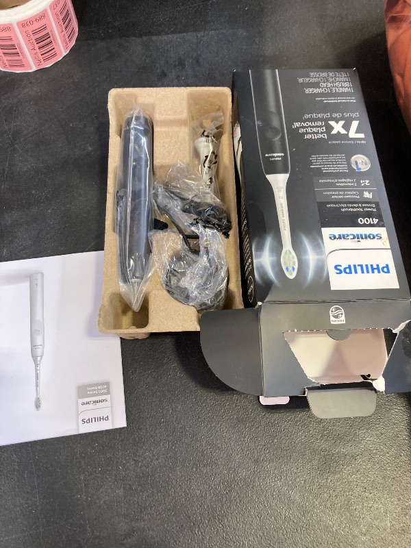 Photo 1 of Philips Sonicare 4100 Rechargeable Electric Toothbrush, with Pressure Sensor, 2 Intensity Settings, SmarTimer and QuadPacer, 14-Day Battery Life, Black, Model HX3681/24
