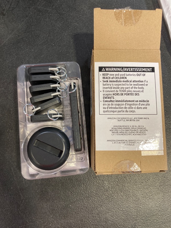 Photo 1 of Amazon Basics Key Finder, Wallet, Pet, Phone, Item Locator - 6 Smart Trackers, 1 Remote, 100 ft (30 m) Range, up to 80dB alarm via RF signals. No phone, mobile app or WiFi required