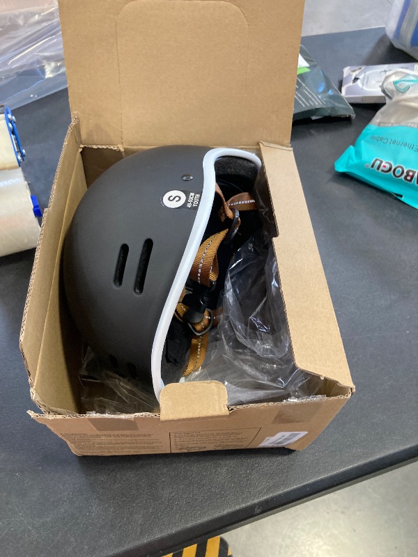 Photo 1 of Retrospec Remi Kids' Bike Helmet for Youth Boys & Girls- Bicycle Helmet with Built-in Visor and Adjustable Reflective Straps for Skateboarding, Scooters, Rollerblading - Matte Black - 49-53cm