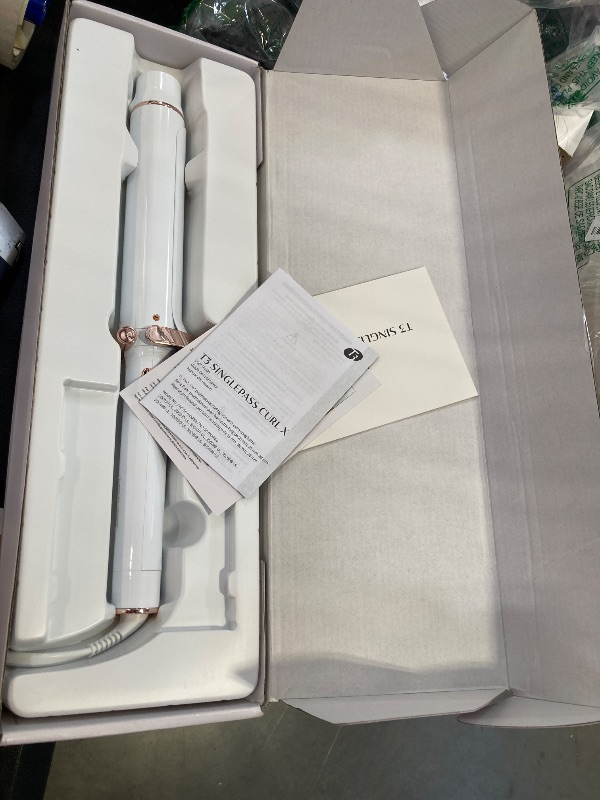 Photo 1 of T3 SinglePass Curl X Extra-Long Barrel Curling Iron with 9 Heat Settings and Ceramic Barrel for Fast Styling and Lasting Results on All Hair Types