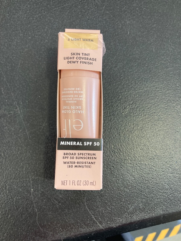 Photo 1 of e.l.f. Halo Glow Skin Tint SPF 50, Tinted Moisturizer For Light, Buildable Coverage, Creates A Natural Glow, Vegan & Cruelty-Free, 5 Light Warm