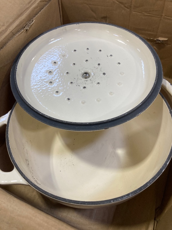 Photo 1 of Amazon Basics Cast Iron Dutch Oven Pot with Lid, Enameled, Round, Dual Handles, Heavy-Duty, Small, 4.3-Quart, White