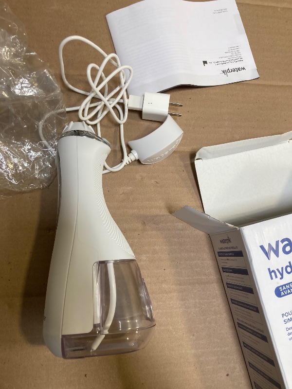 Photo 1 of Waterpik Cordless Advanced 2.0 Water Flosser For Teeth, Gums, Braces, Dental Care With Travel Bag and 4 Tips, ADA Accepted, Rechargeable, Portable, and Waterproof, White WP-580, Packaging May Vary