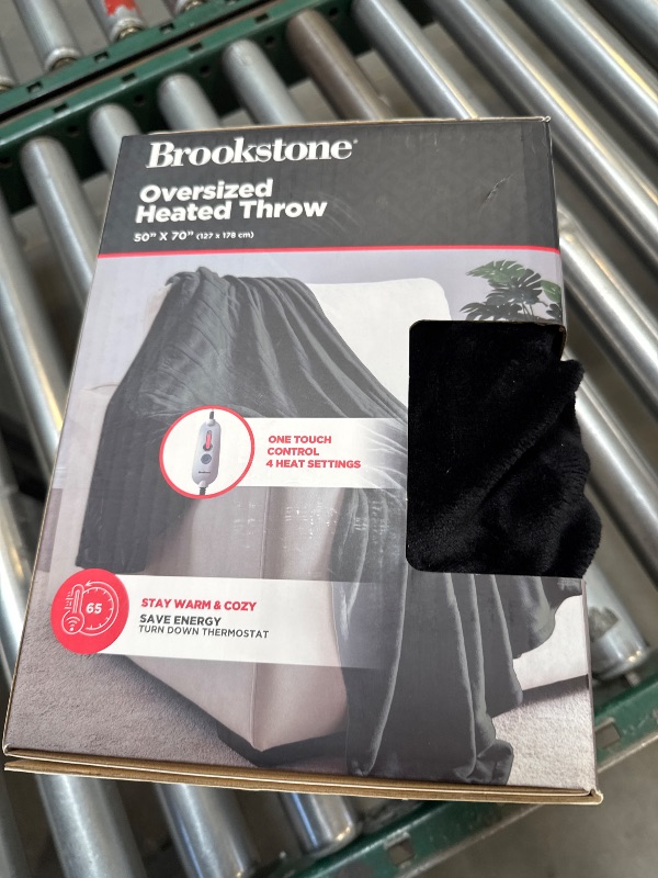 Photo 1 of Brookstone Oversized Electric Heated Throw - Heated Blankets - 4 Heat Settings, 4-Hour Auto Shut Off, 100% Polyester, 50"x60" - Black