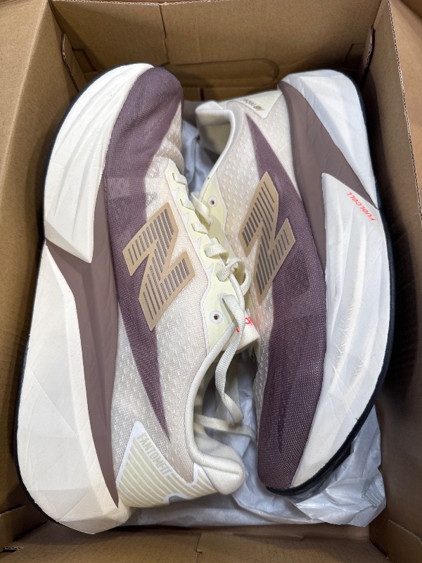 Photo 1 of New Balance Men's FuelCell Rebel V5 Running Shoe, Angora/Earth Shadow/Sea Salt, 10 M
