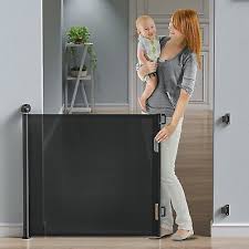 Photo 1 of Retractable Baby Gate Black