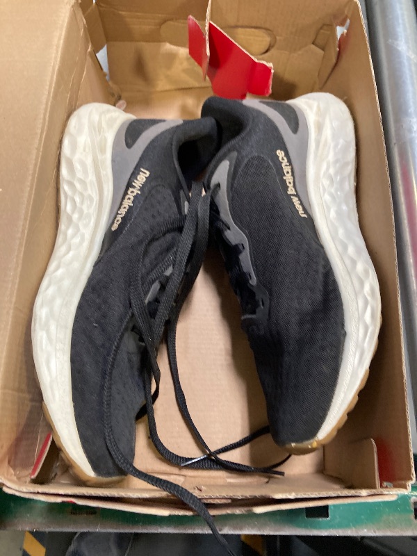 Photo 1 of New Balance Women's Fresh Foam Arishi V4 Running Shoe, Black/Light Gold Metallic/Gum 2, 5.5 Wide