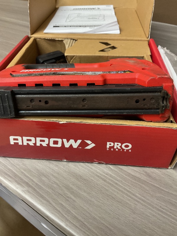 Photo 1 of Arrow ET501C Cordless 5-In-1 Professional Staple and Nail Gun, Battery Powered Wire Stapler and Brad Nailer for Upholstery, Framing, Roofing, Crafts, Fencing, Cable, Black/Red