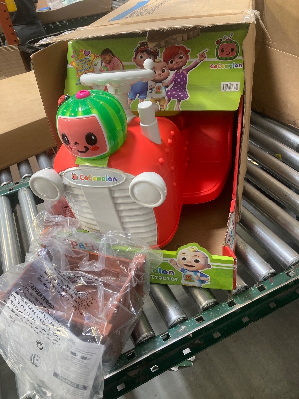 Photo 1 of SPARK 6 Volt Cocomelon Interactive Tractor Ride-on
