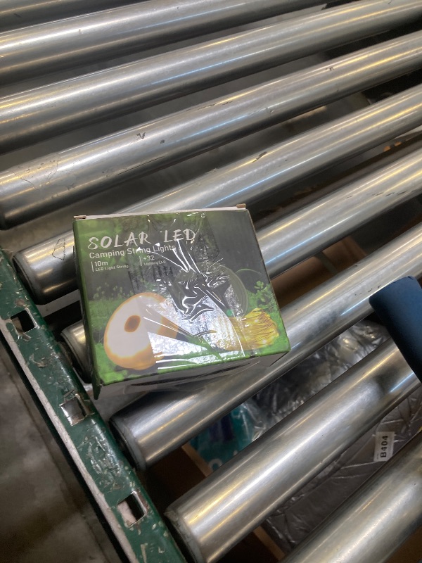 Photo 1 of TuoPuLife Solar Camping String Lights, 32.8FT Fairy String Lights 130LEDs, Portable Waterproof Camping Lamp with 8 Lighting Modes, Hanging Rechargeable Tent Lantern for Awning Garden Yard Party Decor