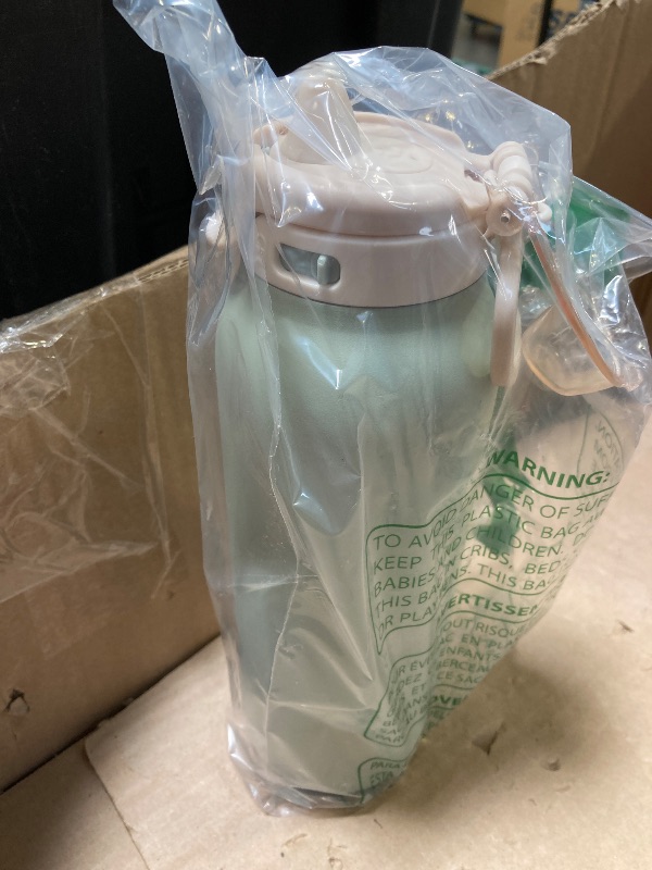 Photo 1 of Ello Pop & Fill 22oz Stainless Steel Water Bottle with Quick Fill Technology, Double Walled and Vacuum Insulated Metal, Leak Proof Locking Lid, Sip and Chug, Reusable, BPA Free, Pistachio