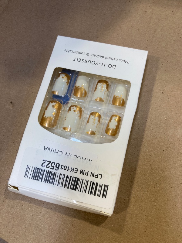 Photo 1 of TBRZTR Gold Press on Nails Medium Square False Nails Golden Smudge Design Artificial Stick on Nails Glossy Coffin Nails Reusable Acrylic Nails 24Pcs Glue on Nails for Women