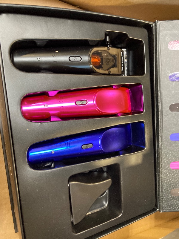 Photo 1 of StyleCraft Ergo Professional Microchipped Magnetic Clipper with 5 Guards, Charging Stand, and 3 Customizable Colored Lids (Black, Pink, Blue)