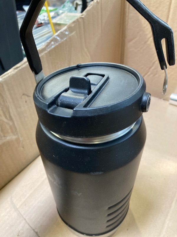 Photo 1 of Stanley IceFlow 2.0 Flip Straw Jug with Handle 64 oz | Twist On Lid and Flip Up Straw | Leakproof for Travel and Sports | Insulated Stainless Steel | BPA-Free | Black 2.0