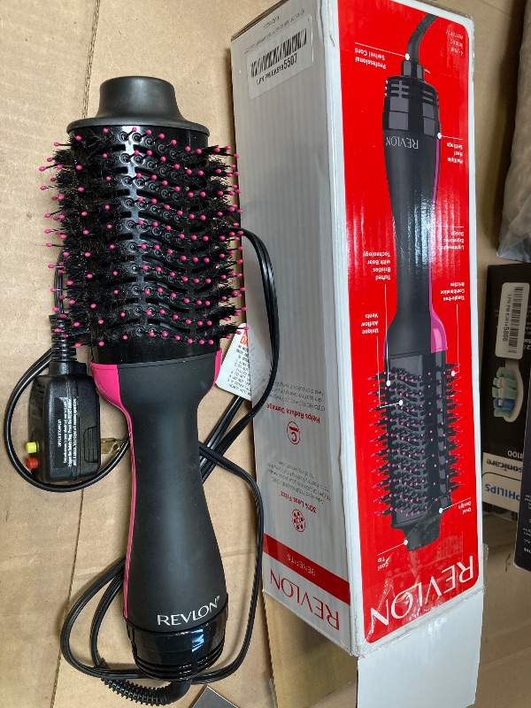 Photo 1 of REVLON One-Step Volumizer Hair Dryer and Styler with Improved Motor – Easy Salon-Style Blowouts – Less Frizz, More Shine, and Reduced Heat Damage, for all Hair Types and Lengths (Black)