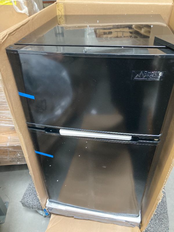 Photo 1 of Arctic King 3.2 Cu Ft Two Door Mini Fridge with Freezer Black E-Star ARM32D5ABB
