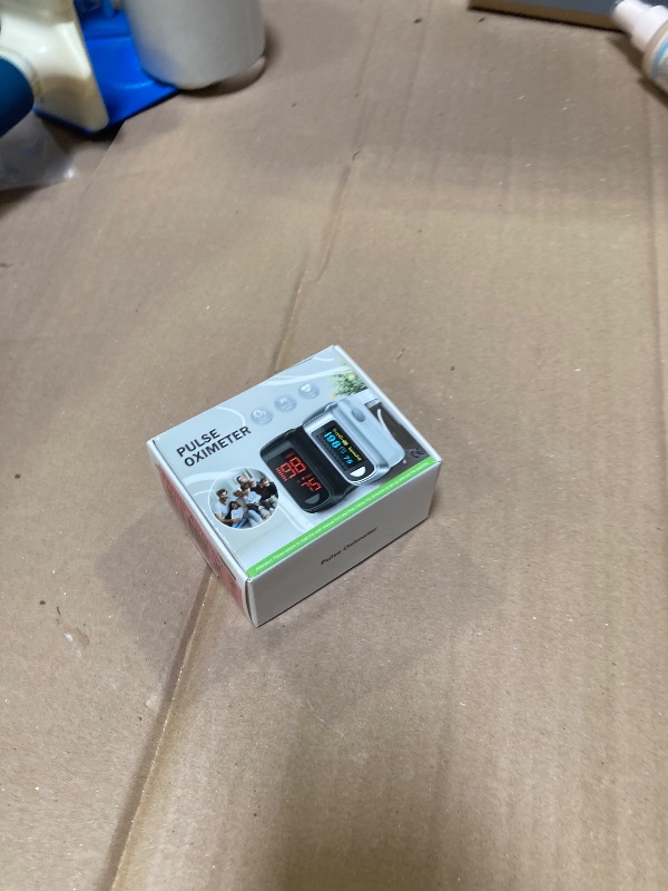 Photo 1 of Fingertip Pulse Oximeter Blood Oxygen Monitor Pulse Ox, Heart Rate and Fast Spo2 Reading Oxygen Meter with OLED Screen Included Batteries and Lanyard