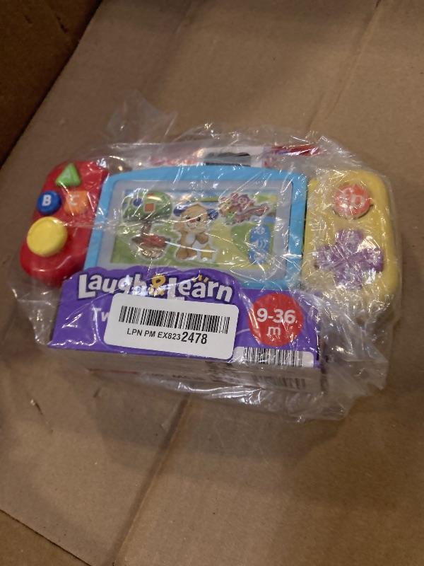 Photo 1 of Fisher-Price Laugh & Learn Baby & Toddler Toy Twist & Learn Gamer Pretend Video Game with Lights & Music for Ages 9+ Months?